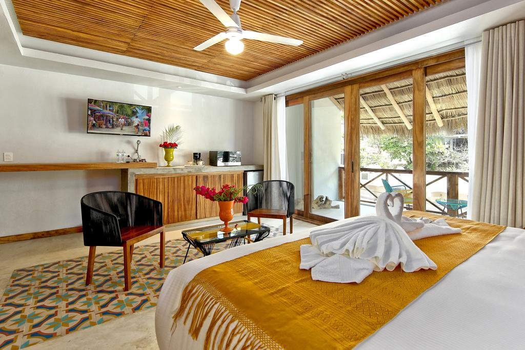 O lindo quarto de casal no Hotel Boutique OZ Sayulit