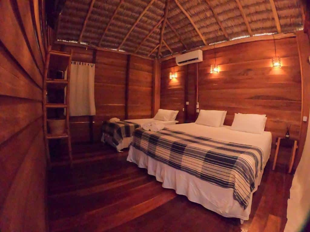 Quarto da Na Praia Pousada.